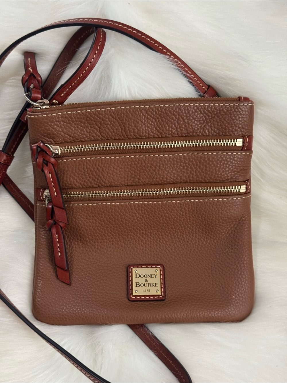 Dooney & Bourke Pebble Grain Brown Leather Crossbody with Red Trim